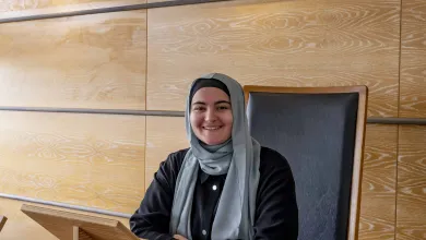 Nora Belkhiter, Law student, sits at the moot court bench in Southampton Law School..