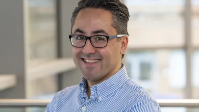 A crisp headshot of Ali Roghanian