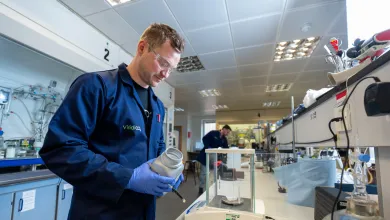 Dan Stewart weighing materials during laboratory research at Viridi.