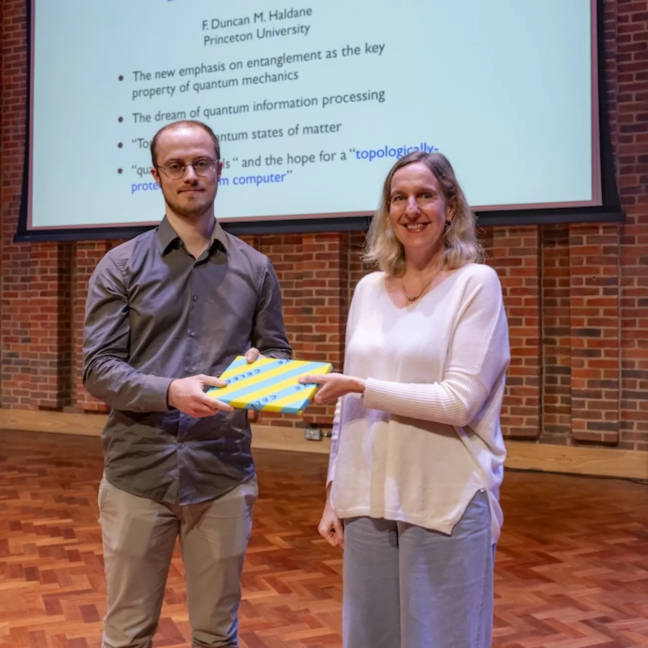 Javier Caballo being presented with prize