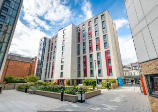 Mayflower C block with the courtyeard garden in the forefront.
