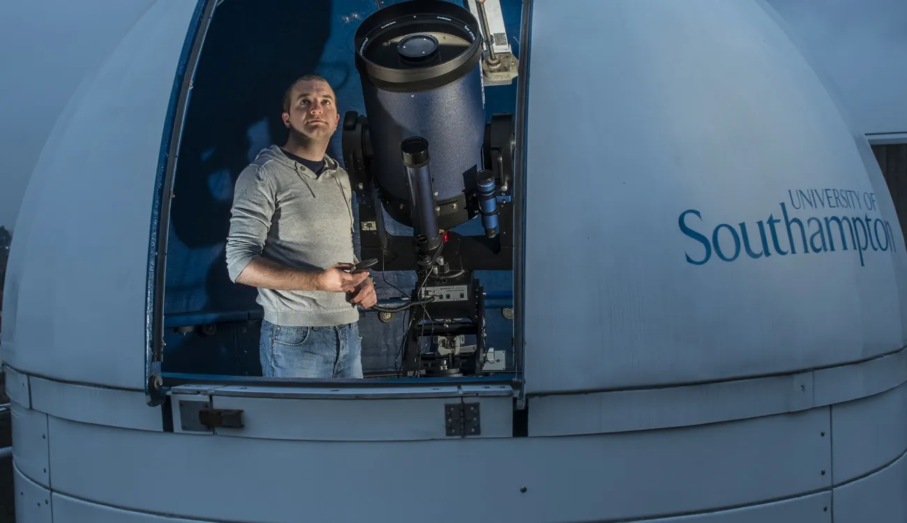 Researcher using a rooftop observatory