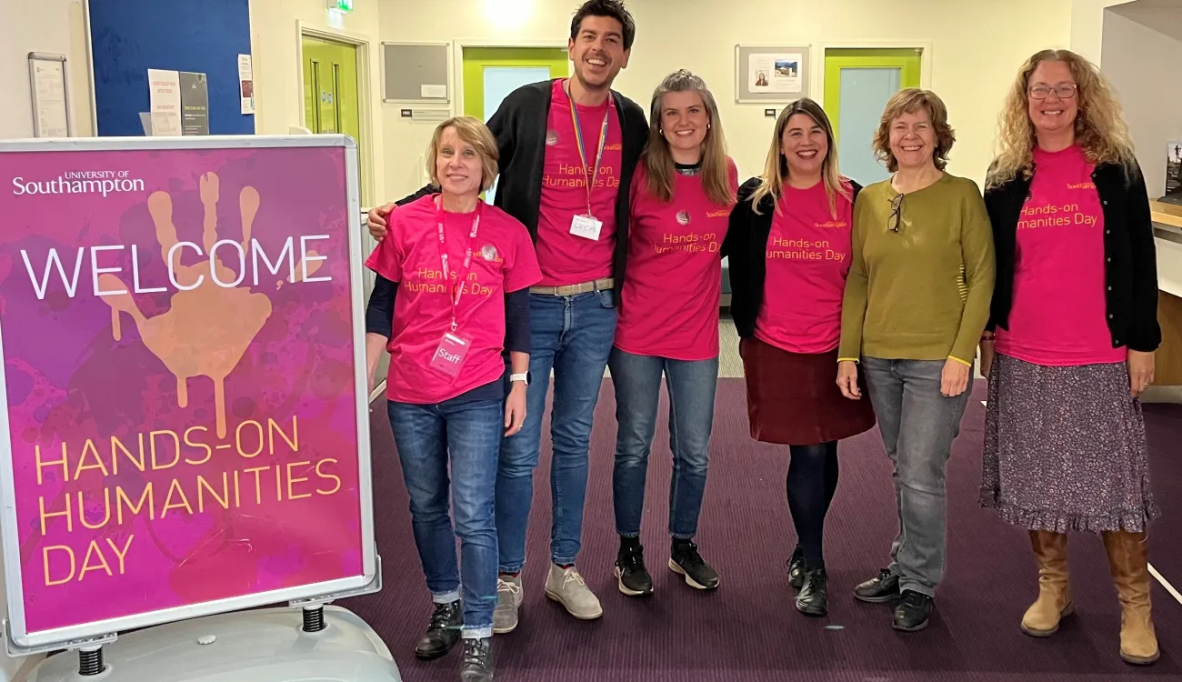 The hands on humanities team of six people pose for the camera