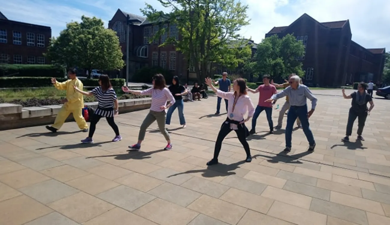 Members of Electronics and Computer Science (ECS) take part in a Tai Chi session