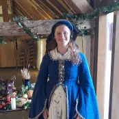 Joanna in medieval dress in the hall at Ufton Court